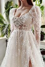 فستان زفاف طويل ساحر بلون العاج بقصة على شكل حرف A بأكمام طويلة ودانتيل مع فتحة جانبية