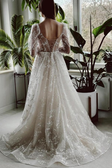 Robe de mariée longue ivoire charmante en ligne A avec manches longues en dentelle et fente