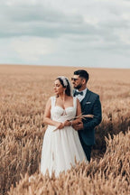 Encantador vestido de novia largo blanco de tul en forma de A, sin mangas y con encaje