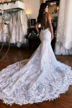Incantevole abito da sposa sirena senza maniche con spalline sottili e gonna lunga fino a terra