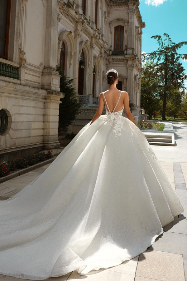 Vestido de novia elegante de corte princesa largo en A con tirantes finos en tul y encaje con purpurina en color marfil