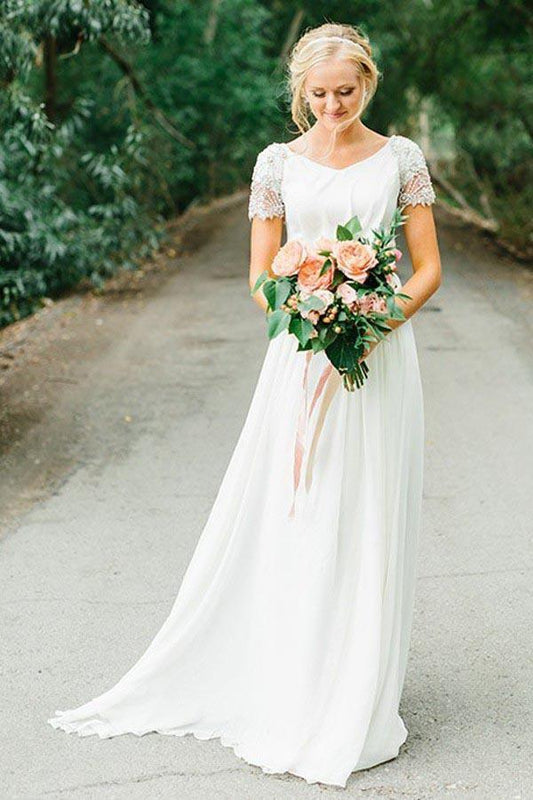 Vestido de novia de gasa con escote en V y corte A con abalorios