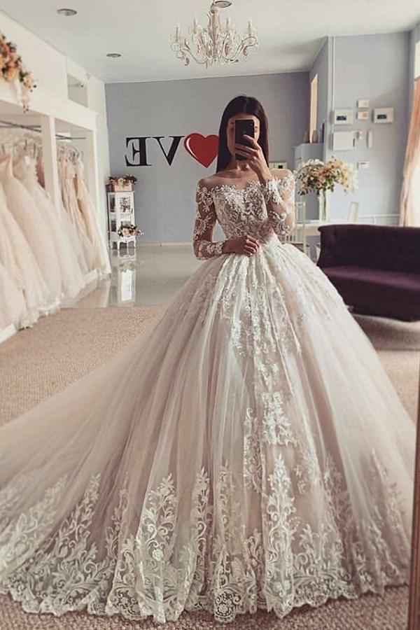 Vestido de novia elegante de corte A largo con escote barco, apliques de encaje y tul, con mangas
