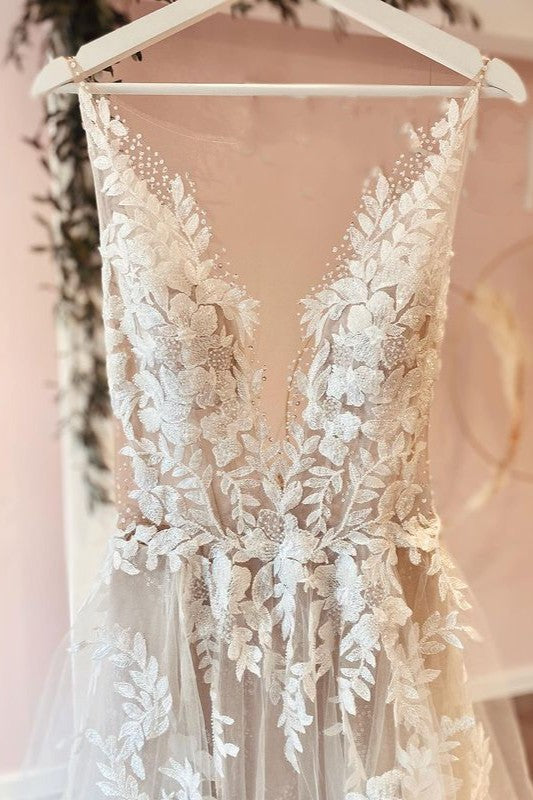 Vestido de novia elegante de corte A largo con apliques de tul y encaje
