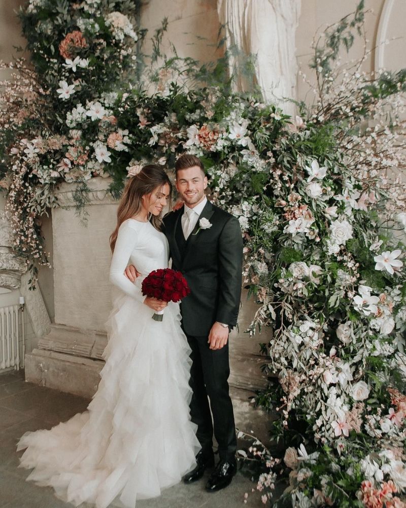 Robe de mariée élégante sans manches fendue