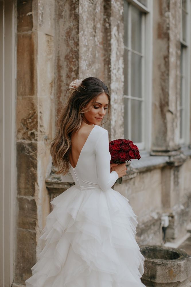 Robe de mariée élégante sans manches fendue