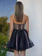 Vestito corto da rientro a casa in tulle a pois con corsetto