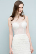 Robes de bal sirène sans manches longueur genou avec franges col rond