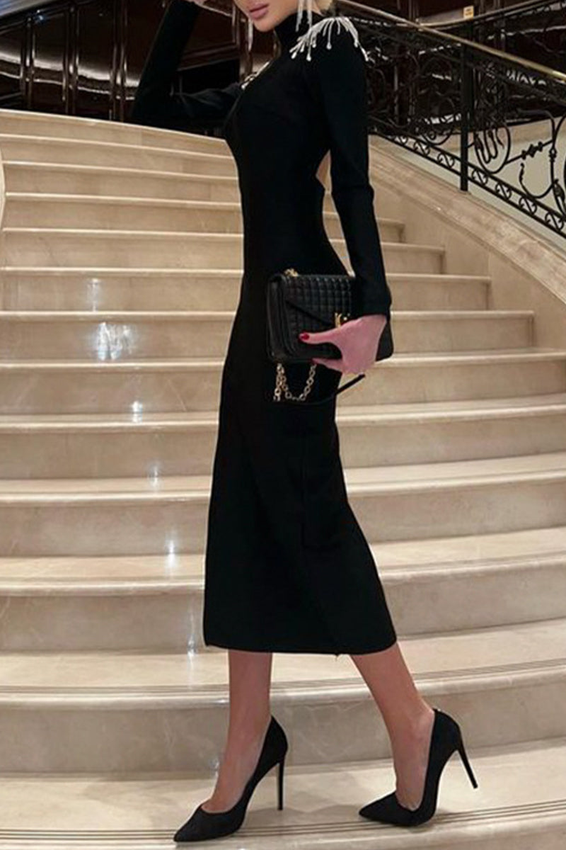 Abito da sera elegante e formale, senza schienale, con spacco, mezza polo e strass, in tinta unita