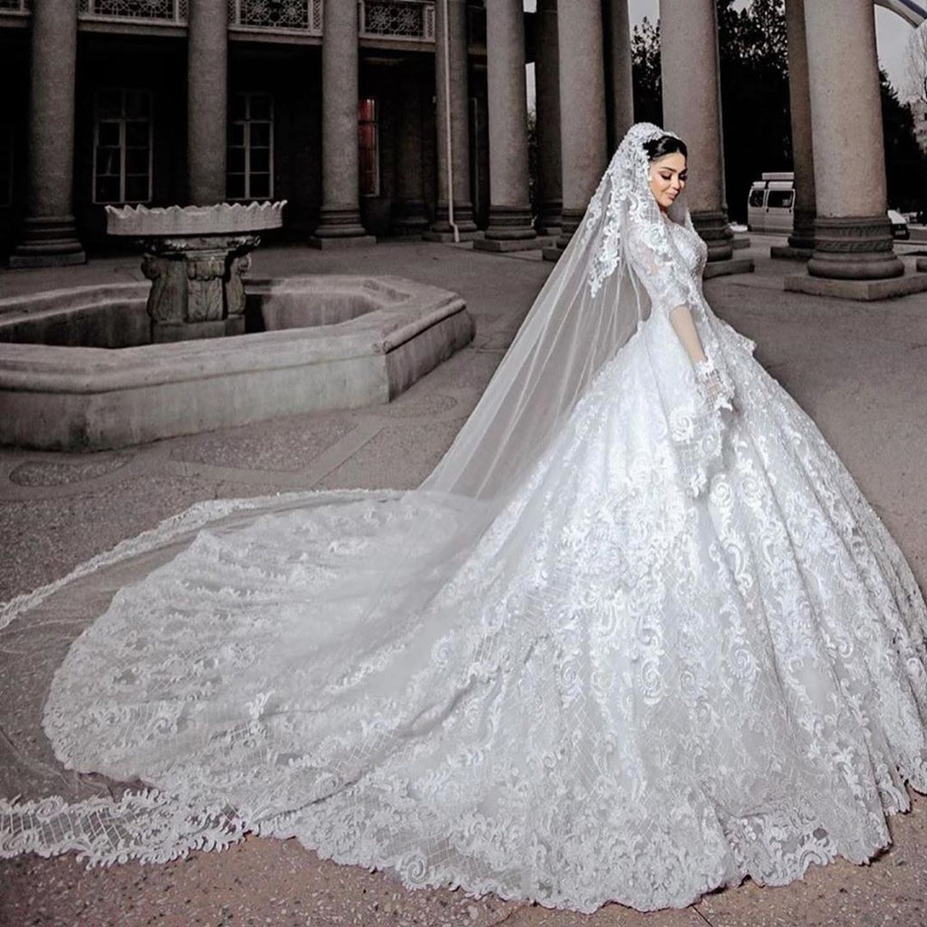 Elegant Beads Long Sleeve Princess Wedding Dress With Tulle And Appliques