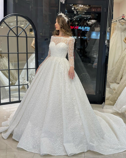 Vestido de novia de lujo de corte A con encaje, mangas largas y volantes, largo hasta el suelo
