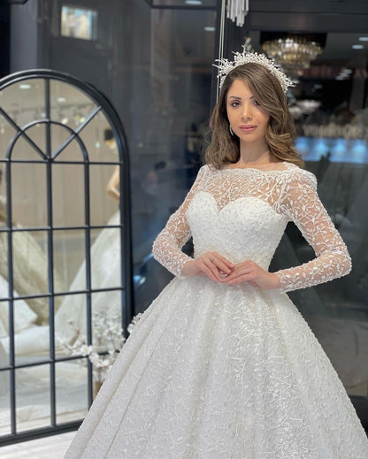 Vestido de novia de lujo de corte A con encaje, mangas largas y volantes, largo hasta el suelo