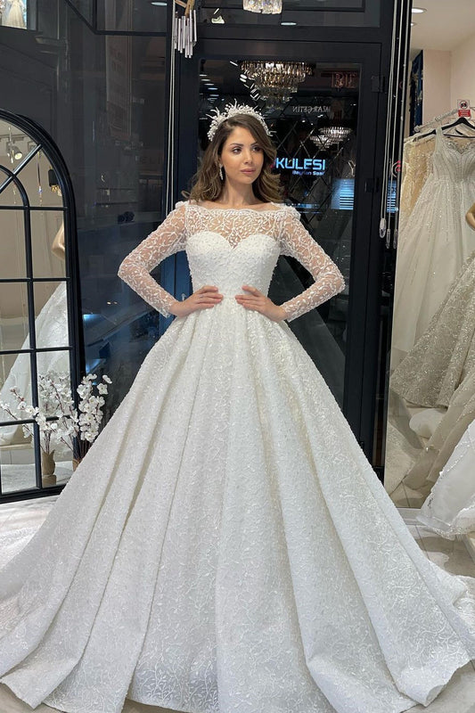 Vestido de noiva de renda com babados e mangas compridas, linha A, comprimento até o chão