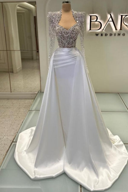 Abito da sera lungo a colonna con scollo a cuore, maniche lunghe, in satin e tulle, decorato con strass