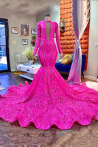 Abito lungo da sera a sirena con maniche lunghe, scollo a V e luccichii, colore fucsia di stilista