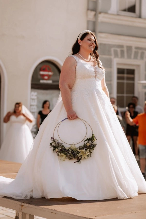 Dreamy Ivory V-Neck Sleeveless Ball Gown Wedding Dress with Appliques and Chapel Train