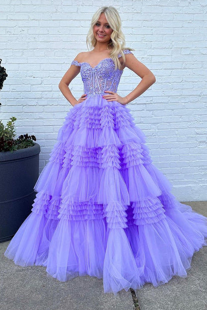 Vestido de fiesta largo de tul con hombros descubiertos y volantes en capas
