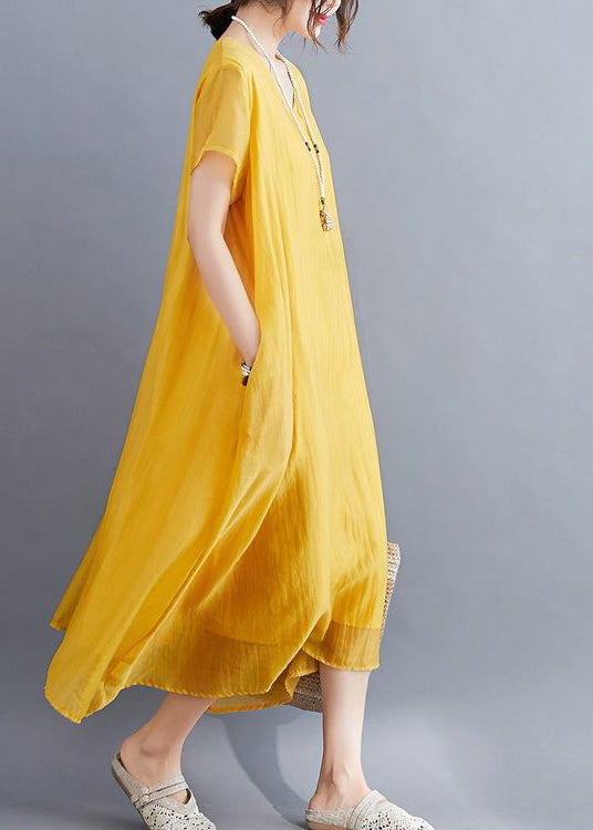 Abito lungo estivo giallo casual in cotone con scollo a V e design asimmetrico