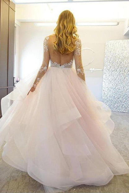 Elegantes vestidos de novia de tul con mangas largas y corte A y apliques