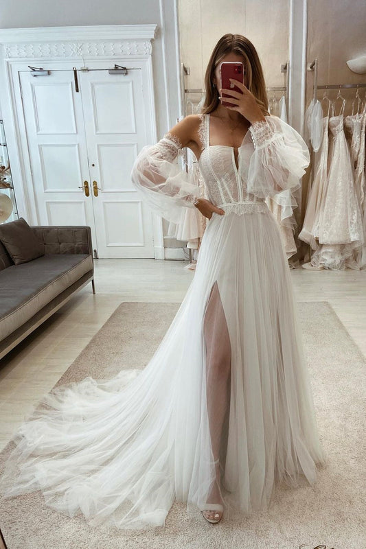 Elegante vestido de noiva com fenda em renda e tule em linha A com mangas