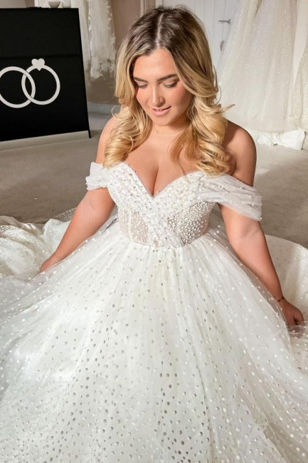Robe de mariée blanche élégante en ligne A, sans manches, à épaules dénudées, ornée de perles