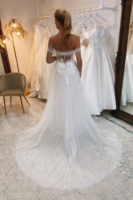 Robes de mariée longues blanches élégantes bohémiennes en dentelle sans manches en tulle coupe trapèze