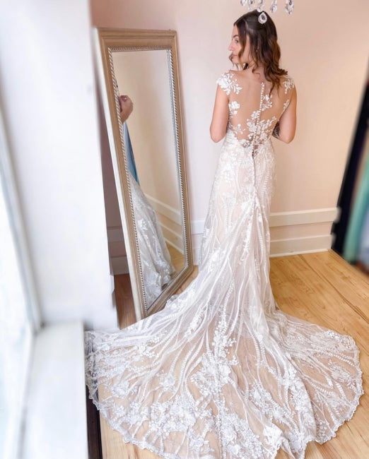 Elegante cremefarbene Meerjungfrau-Brautkleider mit Spitzenapplikationen 