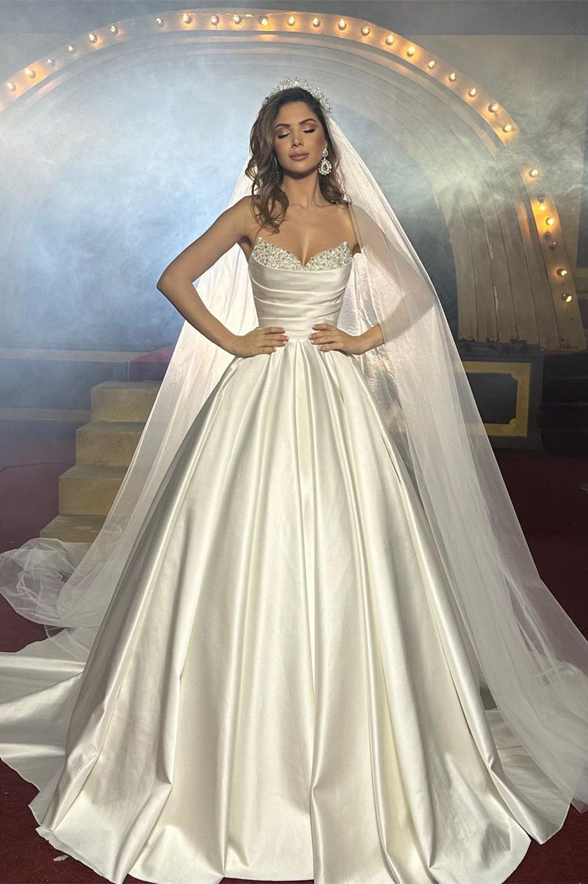 Elegante vestido de novia de satén sin mangas, largo hasta el suelo, corte A y con cuentas