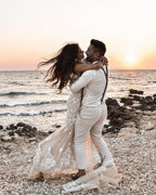 Elegantes langes Meerjungfrau-Brautkleid mit V-Ausschnitt und Blumenspitze