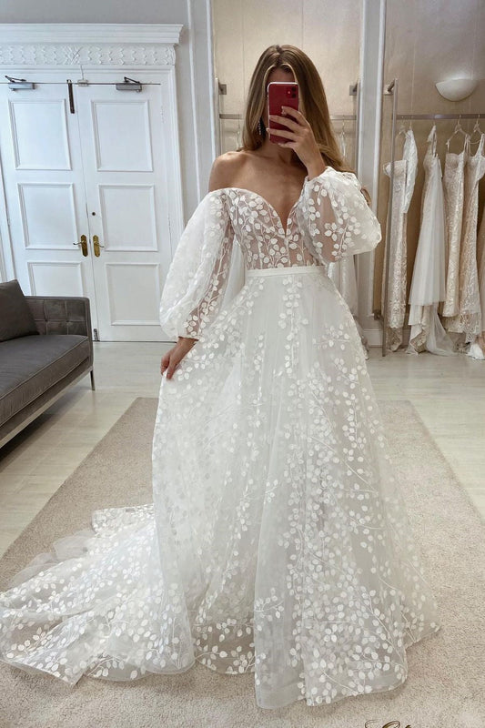 Elegante vestido de noiva com decote em V, ombro a ombro, apliques e mangas compridas