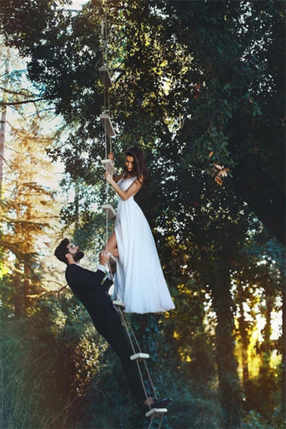 Elegantes vestidos de novia con encaje de gasa hasta el suelo.