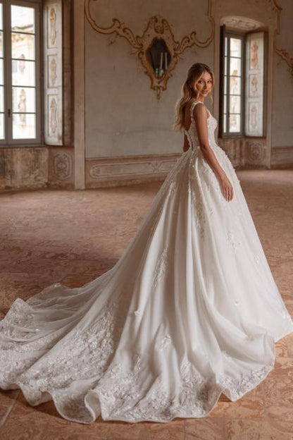 Extravagantes langes elfenbeinfarbenes A-Linien-Prinzessin-Brautkleid mit Spaghettiträgern und Spitze