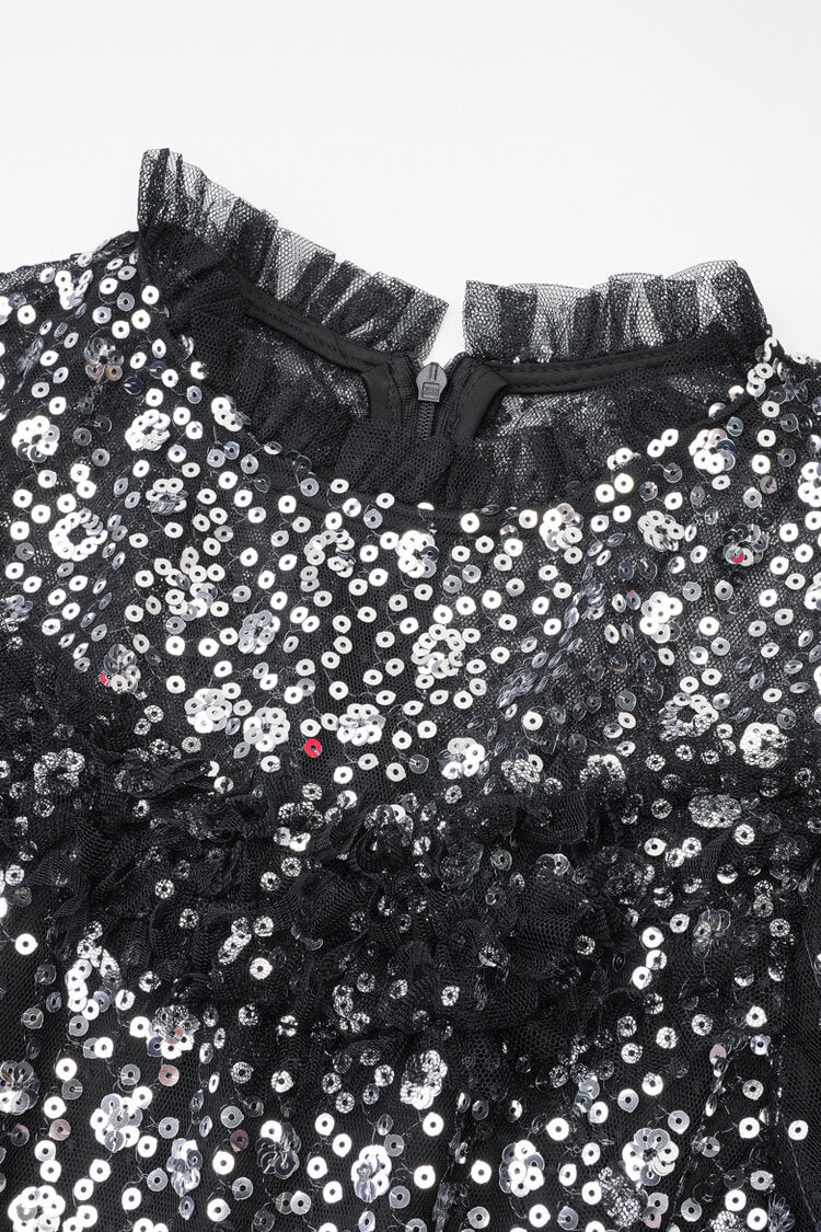 Abito da sera lungo in tulle a balze con collo alto finto, balze a pois e paillettes scintillanti