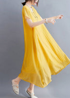 Abito lungo estivo giallo casual in cotone con scollo a V e design asimmetrico