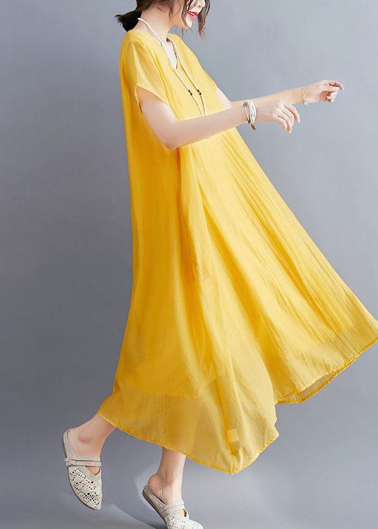 Abito lungo estivo giallo casual in cotone con scollo a V e design asimmetrico