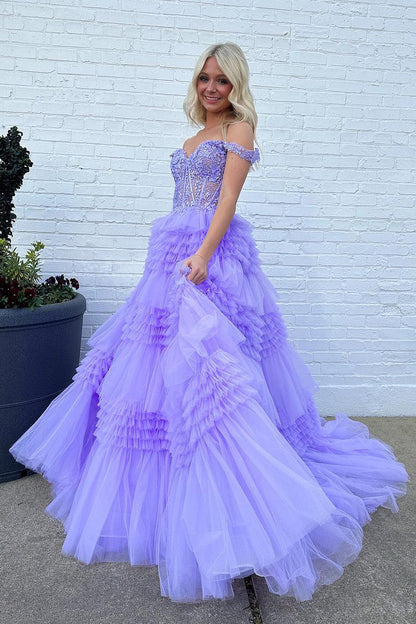 Vestido de fiesta largo de tul con hombros descubiertos y volantes en capas