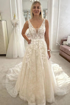 Ivory V Neck Sleeveless A Line Wedding Dress With Appliques And Chapel Train