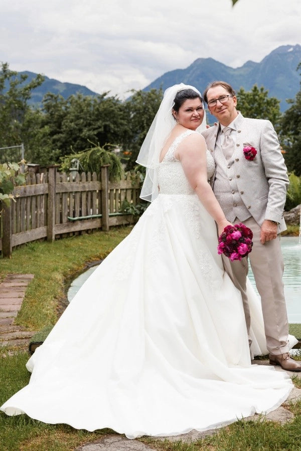 Ivory V Neck Sleeveless A Line Wedding Dress With Appliques And Chapel Train