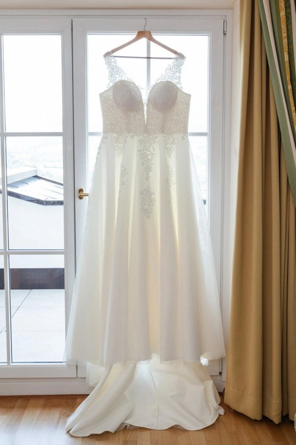 Ivory V Neck Sleeveless A Line Wedding Dress With Appliques And Chapel Train