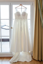 Ivory V Neck Sleeveless A Line Wedding Dress With Appliques And Chapel Train