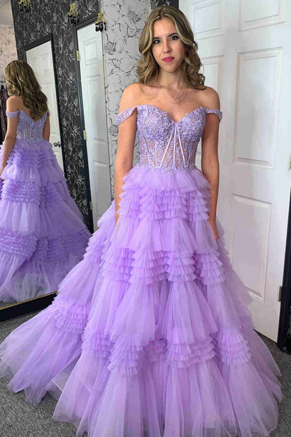 Vestido de fiesta largo de tul con hombros descubiertos y volantes en capas