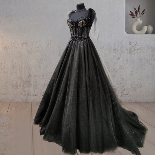 Vestido de novia negro con corte de corsé y tul con encaje brillante