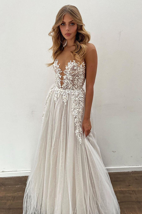Magnifique robe de mariée longue en tulle avec appliques en dentelle coupe trapèze