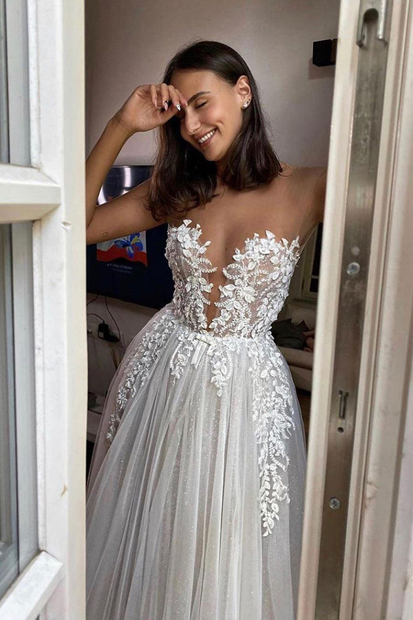 Magnifique robe de mariée longue en tulle avec appliques en dentelle coupe trapèze