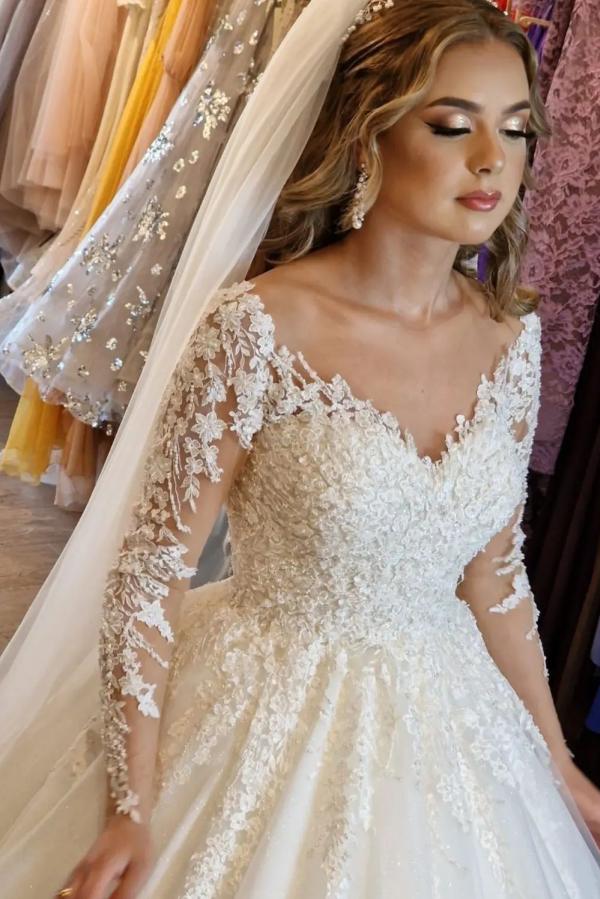 Magnifique robe de mariée blanche longue en ligne A avec col en V et dentelle, manches incluses