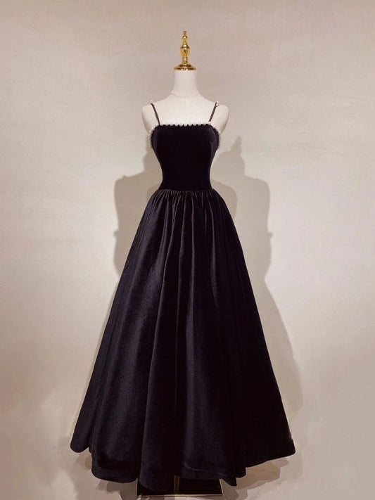 Elegante vestido de fiesta largo con tirantes finos, sin mangas y espalda descubierta con cuentas