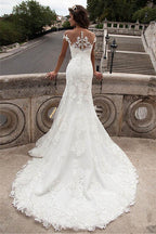 Abito da sposa lungo sirena con scollo illusion e pizzo
