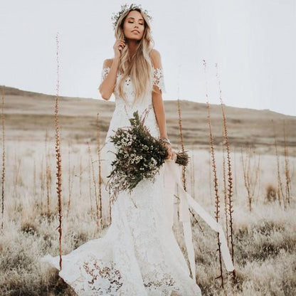 Vestido de novia de encaje sirena color marfil con escote en V y vestido de novia playero