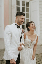 فستان زفاف عاجي بدون أكمام بحمالات وتنورة على شكل حرف A مع ذيل الكنيسة