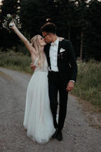 فستان زفاف بسيط بتوب دانتيل وتنورة تول بدون ظهر